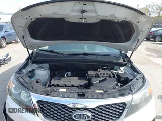 2011 Kia Sorento LX with VIN 5XYKT3A12BG160242, listed as a IAAI auction lot 42220874 with 142,298 mi miles and . Bid and sale history available at carsss.com. Image 10.