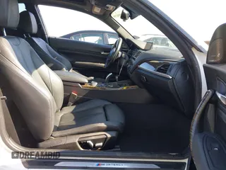 2016 BMW 2 Series M235i with VIN WBA1J7C5XGV359562, listed as a IAAI auction lot 39990299 with 54,022 mi miles. Bid and sale history available at carsss.com. Image 5.