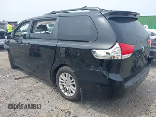 2011 Toyota Sienna XLE AAS with VIN 5TDYK3DC3BS103531, listed as a IAAI auction lot 42290142 with 231,995 mi miles and . Bid and sale history available at DreamBid. Image 3.