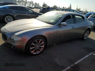 2006 Maserati Quattroporte z VIN ZAMCE39A960026645, wystawiony jako Copart lot #74550174 z przebiegiem 50 591 mil mil oraz Tytuł czysty. Historia ofert i sprzedaży dostępna na DreamBid. Obrazek 1.