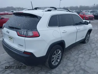 2021 Jeep Cherokee Latitude Lux with VIN 1C4PJLMN7MD130276, listed as a IAAI auction lot 41241629 with 64,485 mi miles. Bid and sale history available at carsss.com. Image 4.