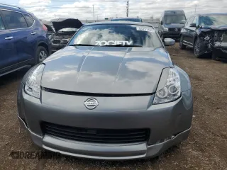2003 Nissan 350Z Touring z VIN JN1AZ34E23T003943, wystawiony jako Copart lot #55221405 z przebiegiem 198 292 mil mil oraz Szkoda całkowita • Salvage title. Historia ofert i sprzedaży dostępna na DreamBid. Obrazek 5.