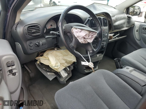 2005 Dodge Caravan SXT with VIN 2D4GP44L95R280846, listed as a Copart auction lot 56608455 with 174,140 mi miles and Salvage title. Bid and sale history available at DreamBid. Image 8.