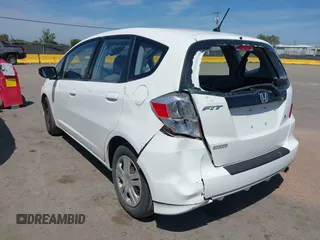 2009 Honda Fit z VIN JHMGE88239S045275, wystawiony jako IAAI lot #42142589 z przebiegiem 145 964 mil mil oraz . Historia ofert i sprzedaży dostępna na DreamBid. Obrazek 3.