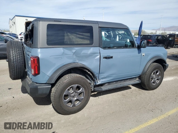 2023 Ford Bronco z VIN 1FMDE5AH6PLB63177, wystawiony jako Copart lot #52208625 z przebiegiem 10 865 mil mil oraz Szkoda całkowita • Salvage title. Historia ofert i sprzedaży dostępna na DreamBid. Obrazek 3.