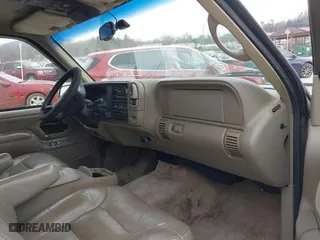 1997 Chevrolet Tahoe with VIN 1GNEK13R4VJ361515, listed as a IAAI auction lot 41768386 with 216,974 mi miles. Bid and sale history available at carsss.com. Image 5.