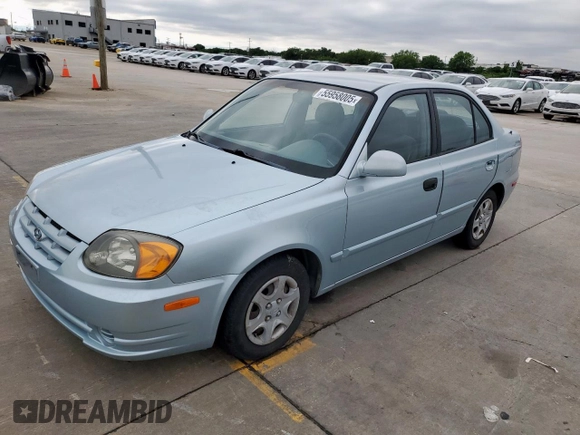 2003 Hyundai Accent GL z VIN KMHCG45C73U481294, wystawiony jako Copart lot #55958005 z przebiegiem 136 964 mil mil oraz Czysty tytuł • Clean title. Historia ofert i sprzedaży dostępna na DreamBid. Obrazek 1.