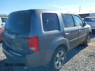 2015 Honda Pilot EX-L with VIN 5FNYF4H52FB070456, listed as a IAAI auction lot 41247639 with 182,998 mi miles and . Bid and sale history available at carsss.com. Image 4.