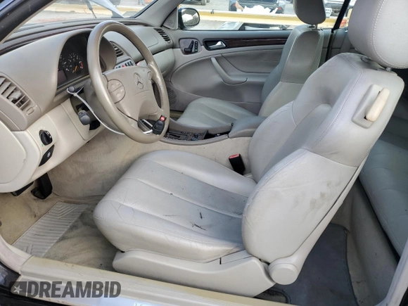 2002 Mercedes-Benz CLK 320/430 with VIN WDBLK65G02T096356, listed as a Copart auction lot 77056434 with 101,971 mi miles and Clean Title. Bid and sale history available at DreamBid. Image 7.