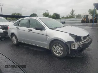 2010 Ford Focus SE with VIN 1FAHP3FN6AW133885, listed as a Copart auction lot 53735205 with 105,849 mi miles and Salvage Title. Bid and sale history available at DreamBid. Image 4.
