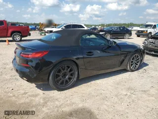 2022 BMW Z4 sDrive30i with VIN WBAHF3C05NWX43513, listed as a Copart auction lot 53292655 with 9,657 mi miles and Salvage Title. Bid and sale history available at carsss.com. Image 3.