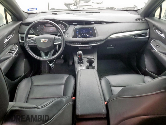 2020 Cadillac XT4 FWD Premium Luxury z VIN 1GYFZCR42LF115413, wystawiony jako Copart lot #56746785 z przebiegiem 41 296 mil mil oraz Szkody całkowita. Historia ofert i sprzedaży dostępna na DreamBid. Obrazek 8.