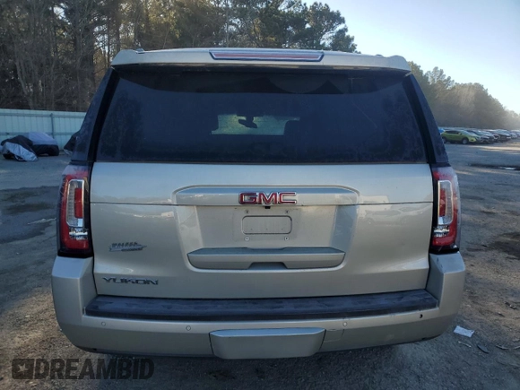 2015 GMC Yukon SLE with VIN 1GKS1AKC4FR265208, listed as a Copart auction lot 42324245 with 105,760 mi miles and Salvage Title. Bid and sale history available at carsss.com. Image 6.