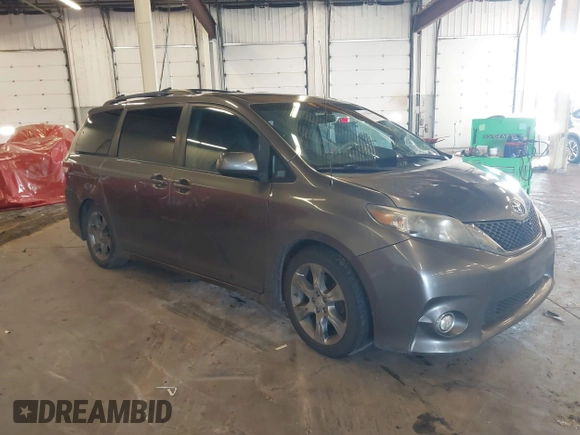 2011 Toyota Sienna SE with VIN 5TDXK3DC7BS034516, listed as a IAAI auction lot 41539955 with 209,309 mi miles. Bid and sale history available at carsss.com. Image 1.