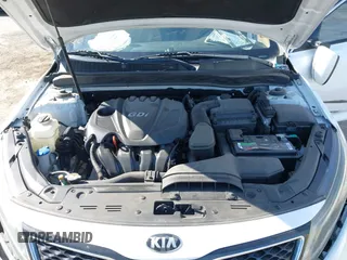 2014 Kia Optima LX with VIN 5XXGM4A70EG307809, listed as a IAAI auction lot 42023169 with 127,617 mi miles. Bid and sale history available at carsss.com. Image 10.