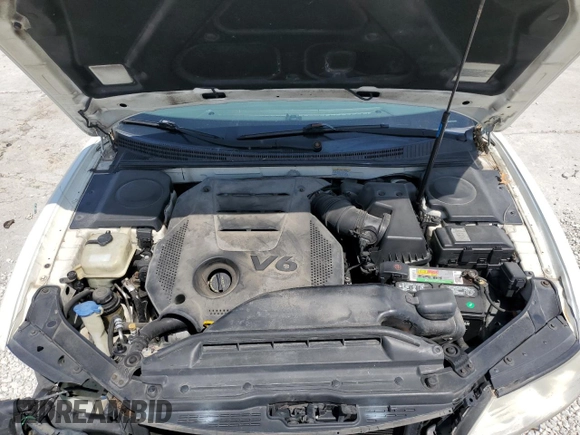 2007 Hyundai Azera SE z VIN KMHFC46F27A181641, wystawiony jako Copart lot #52485025 z przebiegiem 223 170 mil mil oraz Nie do naprawy • Non repairable. Historia ofert i sprzedaży dostępna na DreamBid. Obrazek 11.