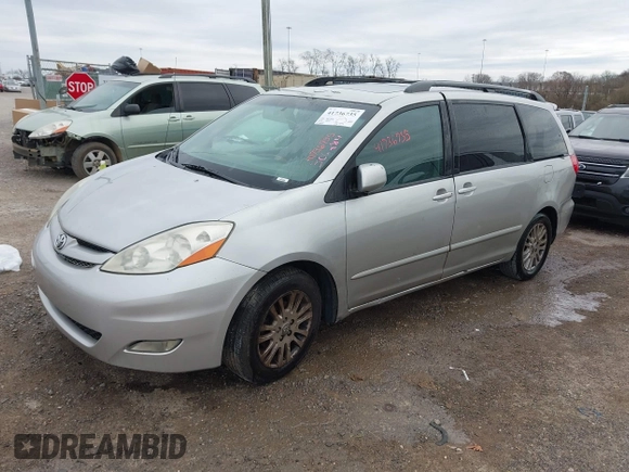 2010 Toyota Sienna XLE with VIN 5TDYK4CC0AS306284, listed as a IAAI auction lot 41736735 with 323,886 mi miles and . Bid and sale history available at carsss.com. Image 2.