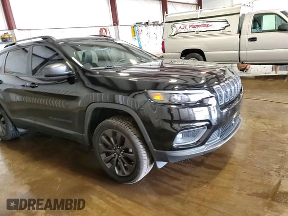 2021 Jeep Cherokee Latitude Lux with VIN 1C4PJMMX2MD218840, listed as a Copart auction lot 61563215 with 28,362 mi miles and Salvage title. Bid and sale history available at DreamBid. Image 14.