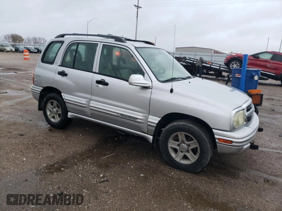 2002 Chevrolet Tracker LT z VIN 2CNBJ634526917089, wystawiony jako Copart lot #79265434 z przebiegiem 131 081 mil mil oraz Czysty tytuł • Clean title. Historia ofert i sprzedaży dostępna na DreamBid. Obrazek 4.