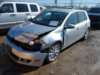 2013 Volkswagen Golf TDI with VIN WVWDM7AJ0DW138100, listed as a IAAI auction lot 41978728 with 103,264 mi miles. Bid and sale history available at carsss.com. Image 2.