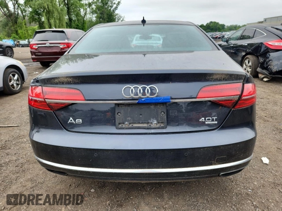 2015 Audi A8 4.0T with VIN WAUJ2AFD6FN011009, listed as a Copart auction lot 64173005 with 153,377 mi miles and Salvage title. Bid and sale history available at DreamBid. Image 6.