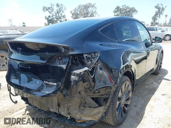2021 Tesla Model Y Performance with VIN 5YJYGDEF1MF092889, listed as a IAAI auction lot 42076715 with 48,373 mi miles and . Bid and sale history available at DreamBid. Image 4.