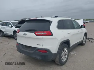 2018 Jeep Cherokee Latitude with VIN 1C4PJLCBXJD558927, listed as a IAAI auction lot 41942214 with 84,289 mi miles. Bid and sale history available at carsss.com. Image 4.
