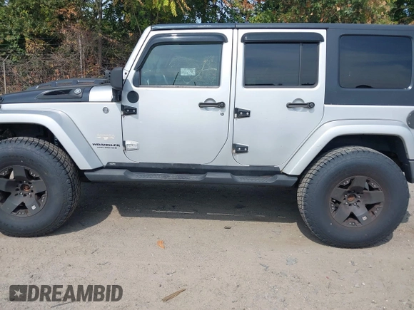 2008 Jeep Wrangler Unlimited Sahara with VIN 1J4GA59158L623784, listed as a IAAI auction lot 40365783 with 185,224 mi miles and . Bid and sale history available at DreamBid. Image 14.