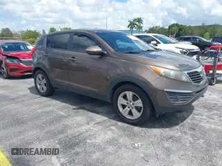 2012 Kia Sportage LX with VIN KNDPB3A28C7210559, listed as a IAAI auction lot 42713303 with 205,009 mi miles and . Bid and sale history available at DreamBid. Image 1.