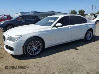 2015 BMW 7 Series with VIN WBAYG6C59FD383685, listed as a Copart auction lot 72630224 with 157,780 mi miles and Salvage title. Bid and sale history available at DreamBid. Image 1.
