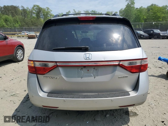 2012 Honda Odyssey Touring with VIN 5FNRL5H93CB121366, listed as a Copart auction lot 55383885 with 197,885 mi miles and Salvage title. Bid and sale history available at DreamBid. Image 6.
