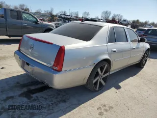 2007 Cadillac DTS V8 z VIN 1G6KD57Y87U140129, wystawiony jako Copart lot #48025875 z przebiegiem 184 526 mil mil oraz Szkody całkowita. Historia ofert i sprzedaży dostępna na DreamBid. Obrazek 3.