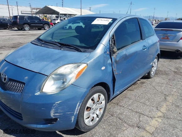 2008 Toyota Yaris with VIN JTDJT923085205341, listed as a IAAI auction lot 41762601 with 218,299 mi miles. Bid and sale history available at carsss.com. Image 6.