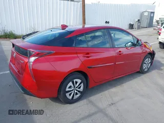 2016 Toyota Prius Four z VIN JTDKARFU3G3506953, wystawiony jako IAAI lot #42239553 z przebiegiem 63 011 mil mil oraz . Historia ofert i sprzedaży dostępna na DreamBid. Obrazek 4.