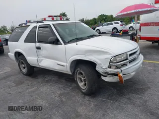 2003 Chevrolet Blazer Xtreme z VIN 1GNCS18X33K152868, wystawiony jako IAAI lot #39801584 z przebiegiem 167 157 mil mil oraz . Historia ofert i sprzedaży dostępna na DreamBid. Obrazek 1.