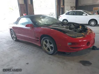 2000 Pontiac Firebird Trans Am with VIN 2G2FV32G7Y2121291, listed as a IAAI auction lot 40095437 with 140,293 mi miles. Bid and sale history available at carsss.com. Image 1.