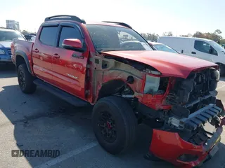 2018 Toyota Tacoma SR5 with VIN 3TMAZ5CN2JM067292, listed as a IAAI auction lot 41851959 with 70,988 mi miles and . Bid and sale history available at DreamBid. Image 13.