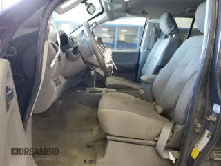 2014 Nissan Frontier SV with VIN 1N6AD0EV9EN710020, listed as a Copart auction lot 60895575 with 125,090 mi miles and Salvage title. Bid and sale history available at DreamBid. Image 7.