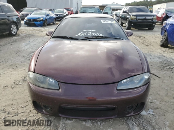 1999 Mitsubishi Eclipse with VIN 4A3AK44Y7XE104372, listed as a Copart auction lot 78361734 with 112,595 mi miles and Salvage Title. Bid and sale history available at DreamBid. Image 5.