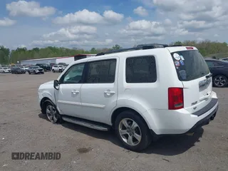 2014 Honda Pilot EX-L with VIN 5FNYF3H50EB005811, listed as a IAAI auction lot 42115804 with 216,033 mi miles and . Bid and sale history available at DreamBid. Image 14.