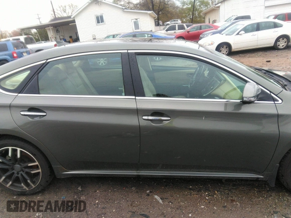 2014 Toyota Avalon Limited with VIN 4T1BK1EBXEU109256, listed as a IAAI auction lot 41908504 with 84,472 mi miles and . Bid and sale history available at DreamBid. Image 12.