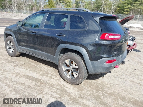 2014 Jeep Cherokee Trailhawk with VIN 1C4PJMBS3EW127749, listed as a IAAI auction lot 41836617 with 207,002 mi miles and . Bid and sale history available at DreamBid. Image 3.