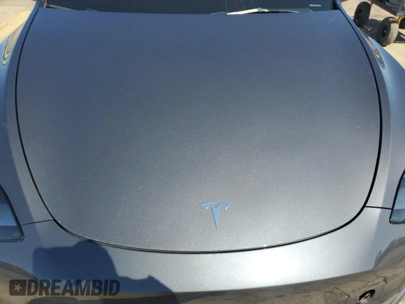 2023 Tesla Model Y Performance z VIN 7SAYGDEF9PF865129, wystawiony jako Copart lot #50228735 z przebiegiem Nie podano mil oraz Szkoda całkowita • Salvage title. Historia ofert i sprzedaży dostępna na DreamBid. Obrazek 12.