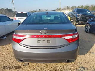 2013 Hyundai Azera with VIN KMHFG4JG6DA243655, listed as a IAAI auction lot 41802097 with 135,677 mi miles. Bid and sale history available at carsss.com. Image 17.