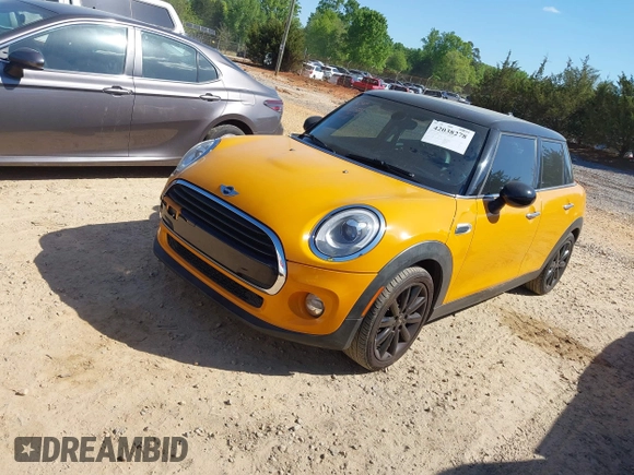 2016 MINI Hardtop 4 Door with VIN WMWXU1C58G2D08712, listed as a IAAI auction lot 42038278 with 96,874 mi miles and . Bid and sale history available at DreamBid. Image 17.