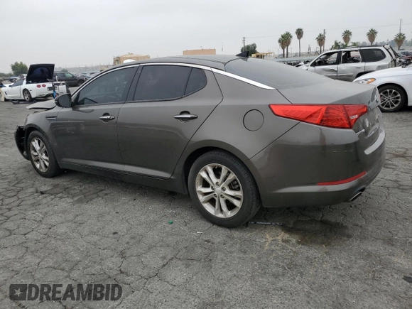 2013 Kia Optima EX with VIN 5XXGN4A78DG107255, listed as a Copart auction lot 61015475 with 168,006 mi miles and Salvage title. Bid and sale history available at DreamBid. Image 2.