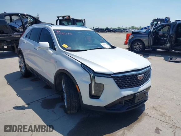 2024 Cadillac XT4 AWD Premium Luxury with VIN 1GYFZDR40RF100102, listed as a IAAI auction lot 41987175 with 4,935 mi miles and . Bid and sale history available at DreamBid. Image 1.