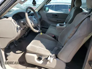 2002 Ford F-150 XL с VIN 1FTRX18L52NB25220, выставлен на аукционе Copart как лот 58202165 с пробегом 298 885 миль миль и Списание • Salvage title. История ставок и продаж доступна на DreamBid. Изображение 7.