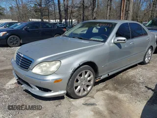 2003 Mercedes-Benz S-Class 5.0L with VIN WDBNG84J03A377024, listed as a IAAI auction lot 41749903 with 114,096 mi miles. Bid and sale history available at carsss.com. Image 2.