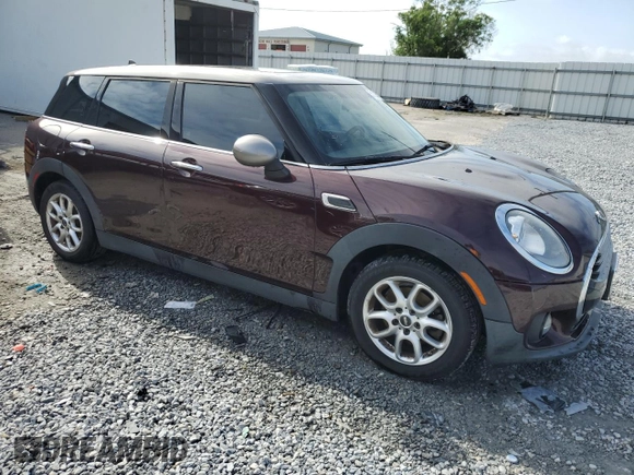 2017 MINI Clubman Cooper with VIN WMWLN5C51H2E32907, listed as a Copart auction lot 51226515 with 124,907 mi miles and Salvage Title. Bid and sale history available at DreamBid. Image 4.